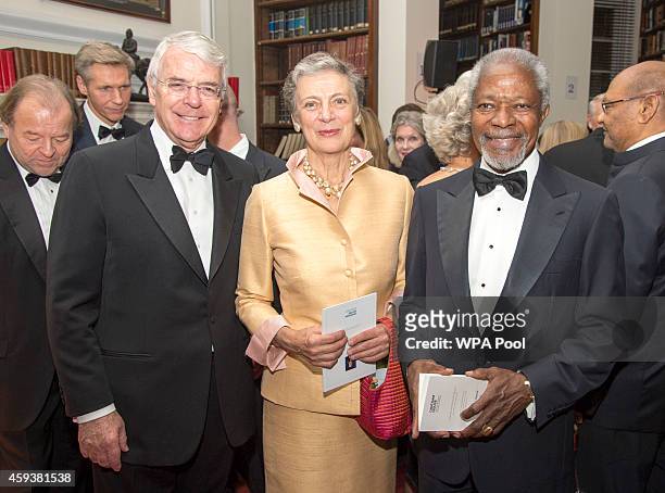 John Major, Kofi Annan and Nene Annan attend the RUSI Chatham House Prize 2014 presentation in the Banqueting House on November 21, 2014 in London,...