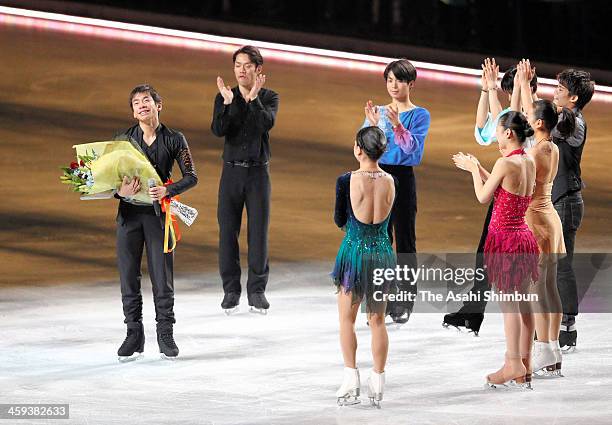 Nobunari Oda receives a flower bunch during the gala exhibition as he announced the retirement during day four of the 82nd All Japan Figure Skating...