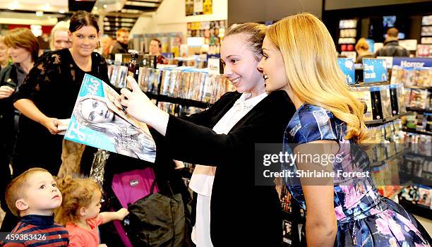 Katherine Jenkins meets fans and signs copies of her new album 'Home Sweet Home' at HMV on November 21, 2014 in Manchester, England.