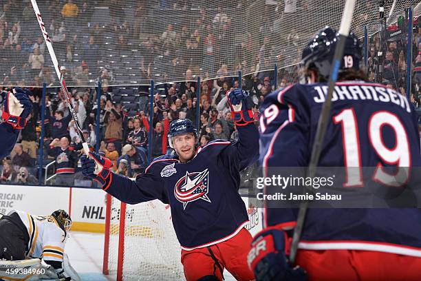Ryan Johansen of the Columbus Blue Jackets celebrates his first period goal with teammate Boone Jenner of the Columbus Blue Jackets during a game...