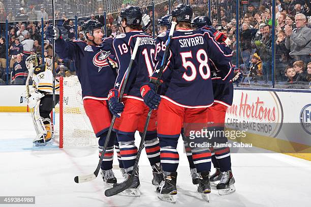 The Columbus Blue Jackets celebrate a first period goal against the Boston Bruins on November 21, 2014 at Nationwide Arena in Columbus, Ohio.