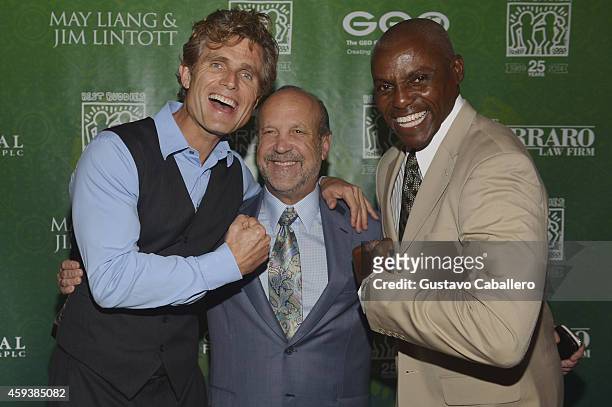 Anthony K. Shriver, Ron Book, and olympic gold metalist Carl Lewis attend the 18th Annual Best Buddies Miami Gala: Southeast Asia at Fontainebleau...