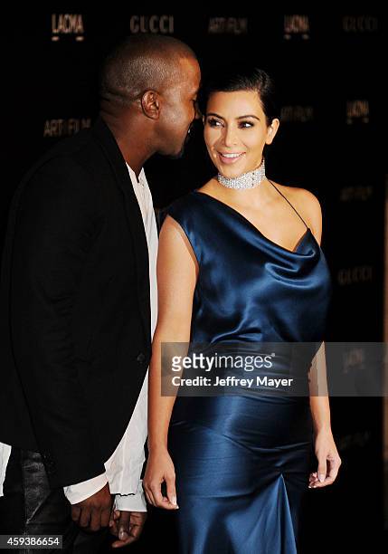 Recording artist Kanye West and TV personality Kim Kardashian attend the 2014 LACMA Art + Film Gala honoring Barbara Kruger and Quentin Tarantino...