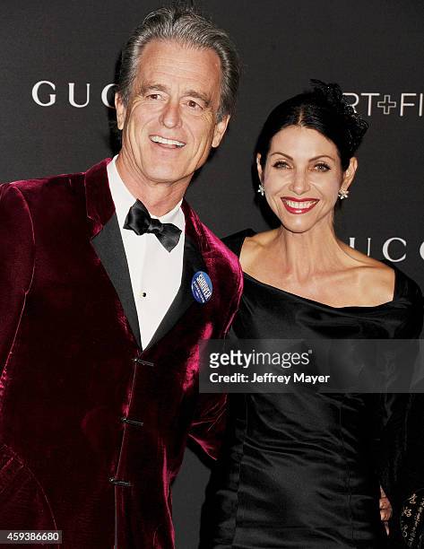 Activists Bobby Shriver and Malissa Feruzzi attend the 2014 LACMA Art + Film Gala honoring Barbara Kruger and Quentin Tarantino presented by Gucci at...