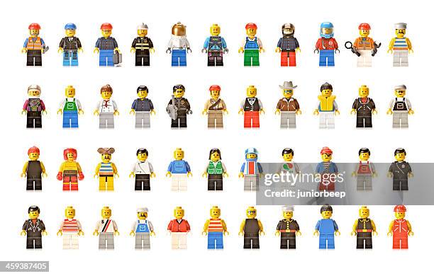 lego figures men and women - lego blocks stock pictures, royalty-free photos & images