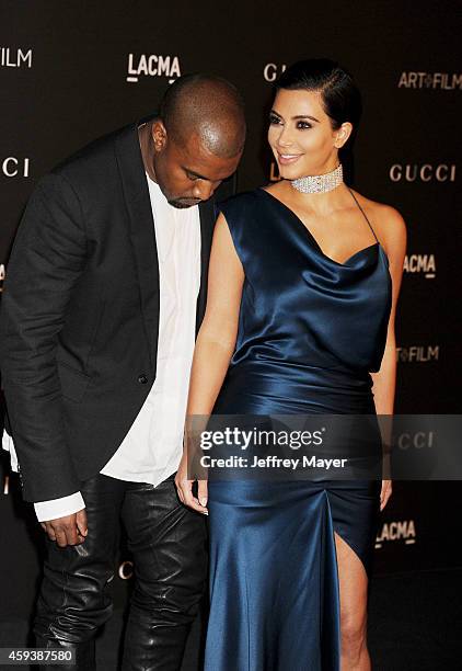 Recording artist Kanye West and TV personality Kim Kardashian attend the 2014 LACMA Art + Film Gala honoring Barbara Kruger and Quentin Tarantino...