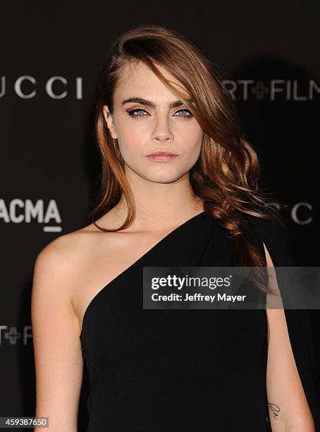 Actress Cara Delevingne attends the 2014 LACMA Art + Film Gala honoring Barbara Kruger and Quentin Tarantino presented by Gucci at LACMA on November...