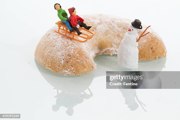 miniature snowman, children and vanillekipferl. - snowman isolated stock pictures, royalty-free photos & images