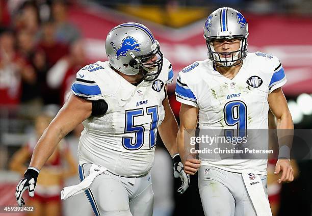 Quarterback Matthew Stafford of the Detroit Lions runs off the field after a turnover on downs during the fourth quarter of the NFL game against the...