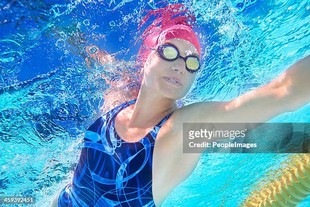 closing in on the win - swimming free style pool stock pictures, royalty-free photos & images