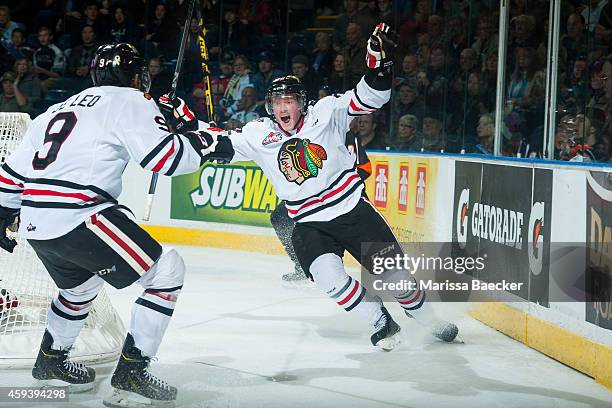 Alex Schoenborn of Portland Winterhawks celebrates scoring the winning goal in overtime against the Kelowna Rockets on November 21, 2014 at Prospera...