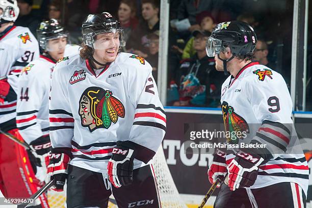 Miles Koules and Chase De Leo of Portland Winterhawks celebrate a third period goal against the Kelowna Rockets on November 21, 2014 at Prospera...