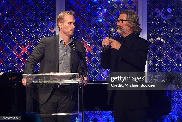 Sportscaster Joe Buck and host Kurt Russell speak at Goldie Hawn's inaugural "Love In For Kids" benefiting the Hawn Foundation's MindUp program...