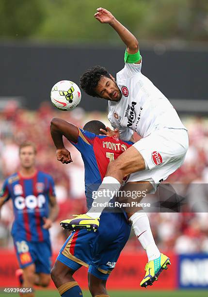 Nikolai Topor-Stanley of the Wanderers competes for the ball against Edson Montano of the Jets during the round seven A-League match between the...