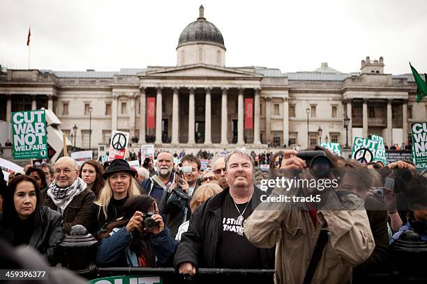 anti war crowd, trafalgar square, london. - westminster square stock pictures, royalty-free photos & images