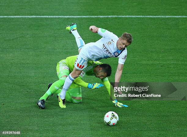 Damien Duff of Melbourne City is challenged by Sydney FC goalkeeper Vedran Janjetovic during the round seven A-League match between Melbourne City...