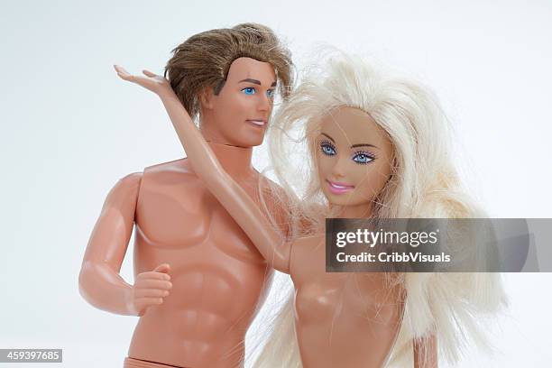 ken and barbie two dolls on white - sindy stock pictures, royalty-free photos & images