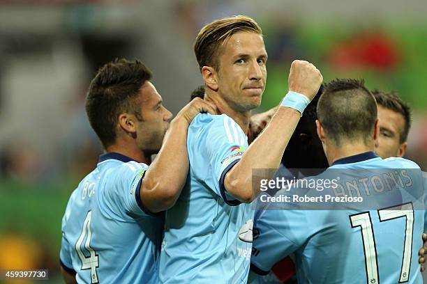 Marc Janko of Sydney celebrates with team-mates after scoring a goal during the round seven A-League match between Melbourne City and Sydney FC at...
