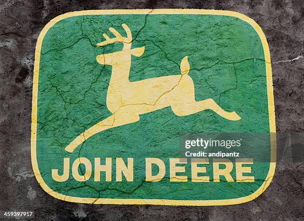 The John Deere logo appears on the floor mat of a new tractor at