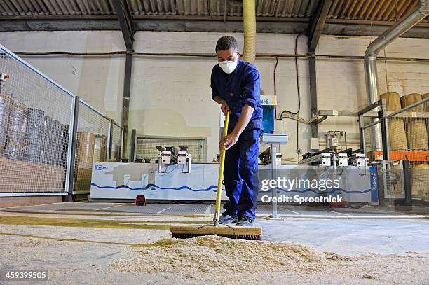 factory worker sweeping landscape - sweeping landscape stock pictures, royalty-free photos & images