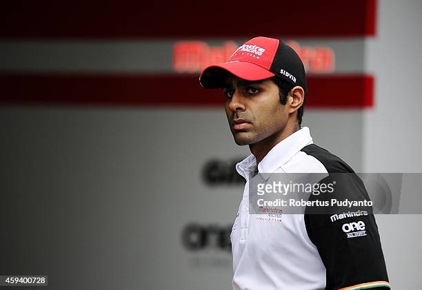 Karun Chandhok of India and Mahindra Racing Formula E Team walks into the garage during the Formula E Championship race on November 22, 2014 in...