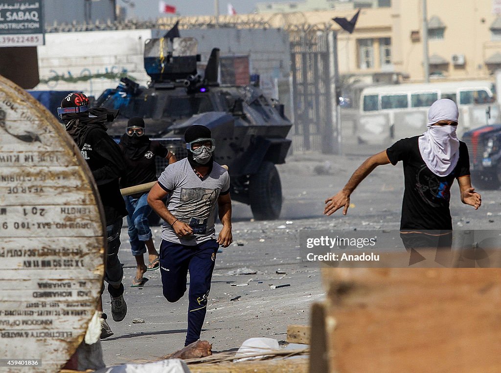 Clashes between Bahraini security forces and protestors boycotting elections