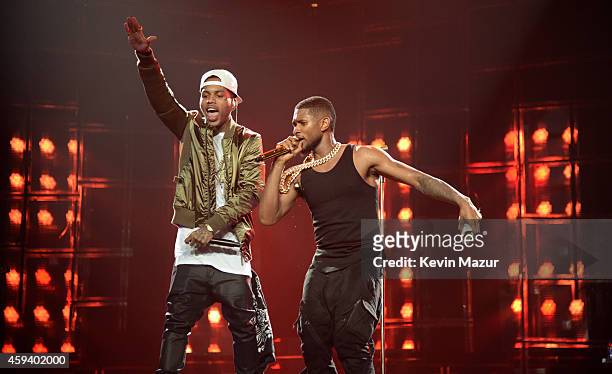 Recording artists Kid Ink and Usher perform onstage during "The UR Experience" tour at Staples Center on November 21, 2014 in Los Angeles, California.