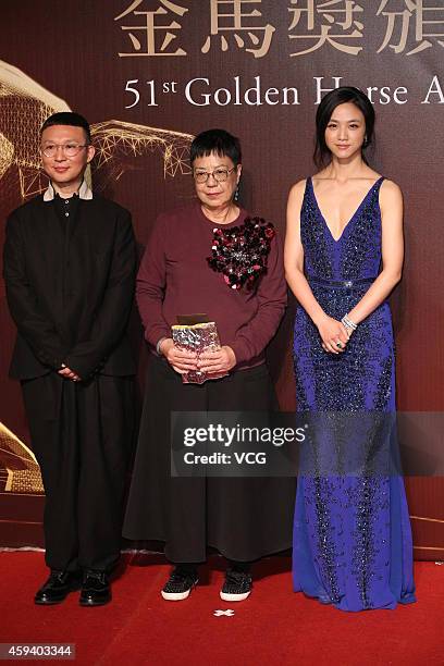 Scriptwriter Qiang Li, actress Ann Hui and actress Tang Wei arrive at the red carpet of the 51st Golden Horse Awards at Sun Yat-sen Memorial Hall on...