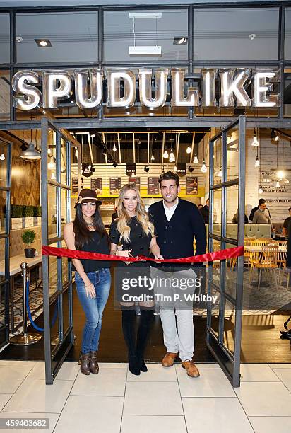 Casy Batchelor with Lauren Pope and James Argent from 'The Only Way Is Essex' help cut the ribbon at the Spudulike opening at Lakeside Shopping...