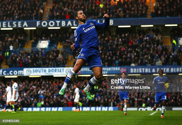 Eden Hazard of Chelsea celebrates scoring the first goal during the Barclays Premier League match between Chelsea and Swansea City at Stamford Bridge...