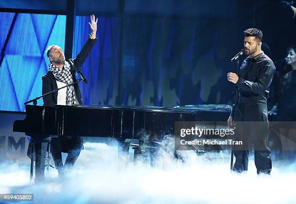 Mario Domm of music group Camila and Ricky Martin perform onstage during the 15th Annual Latin GRAMMY Awards held at the MGM Grand Arena on November...