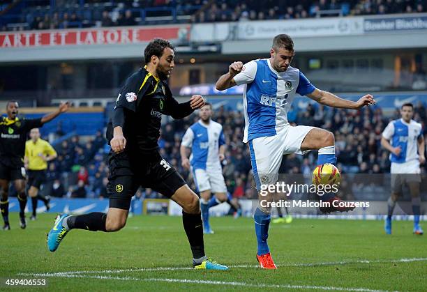 Tommy Spurr of Blackburn Rovers competes with Atdhe Nuhul of Sheffield Wednesday during the Sky Bet Championship match between Blackburn Rovers and...