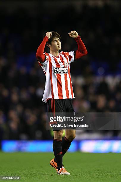 Goalscorer Ki Sung-Yong of Sunderland celebrates following his team's 1-0 victory during the Barclays Premier League match between Everton and...