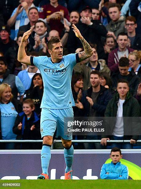 Manchester City's Montenegrin striker Stevan Jovetic celebrates scoring the equalising goal during the English Premier League football match between...