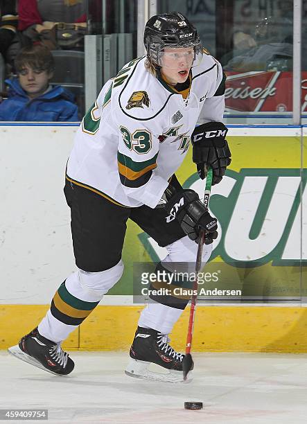 Julius Bergman of the London Knights skates with the puck against the Mississauga Steelheads in an OHL game at Budweiser Gardens on November 21, 2014...