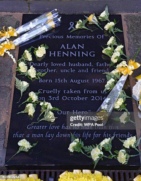 Memorial stone is unveiled in memory of murdered British aid worker Alan Henning at Eccles Parish Church on November 22, 2014 in Manchester, United...