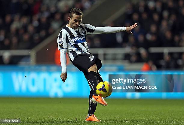 Newcastle United's French midfielder Yohan Cabaye shoots at goal during the English Premier League football match between Newcastle United and Stoke...