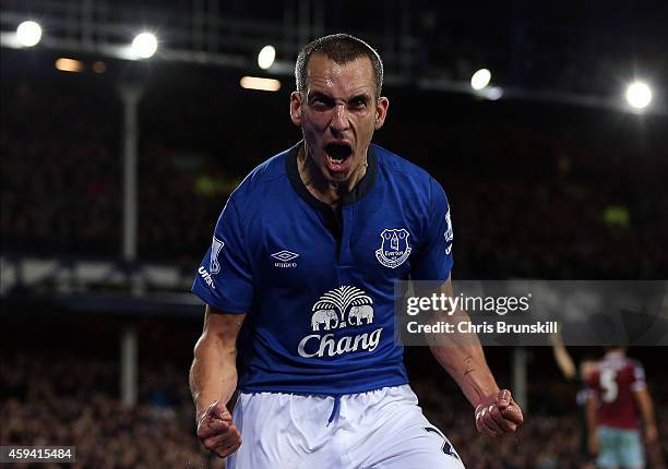 Leon Osman of Everton celebrates scoring his side's second goal during the Barclays Premier League match between Everton and West Ham United at...