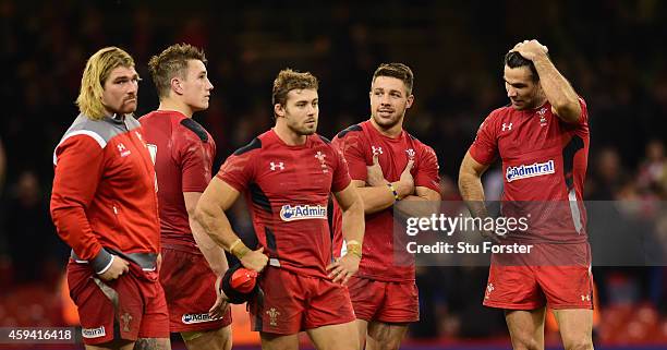 Richard Hibbard Mike Phillips and Wales team mates look on dejectedly after the International match between Wales and New Zealand All Blacks at...