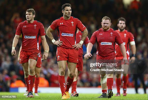 Mike Phillips of Wales looks dejected after his side concede a fourth try during the International match between Wales and New Zealand at the...