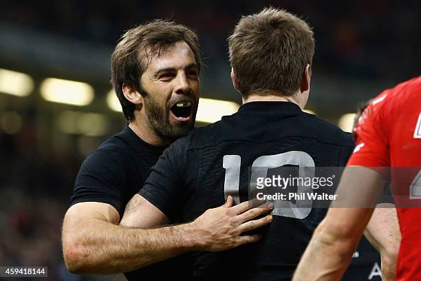Conrad Smith of the All Blacks congratulates Beauden Barrett during the Intenational match between Wales and the New Zealand All Blacks at the...