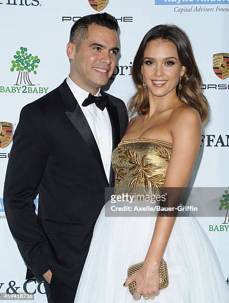 Actress Jessica Alba and Cash Warren arrive at the 2014 Baby2Baby Gala presented by Tiffany & Co. Honoring Kate Hudson at The Book Bindery on...