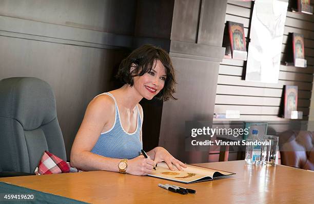 Actress Evangeline Lilly signs copies of her new book "The Squickerwonkers" at Barnes & Noble bookstore at The Grove on November 22, 2014 in Los...