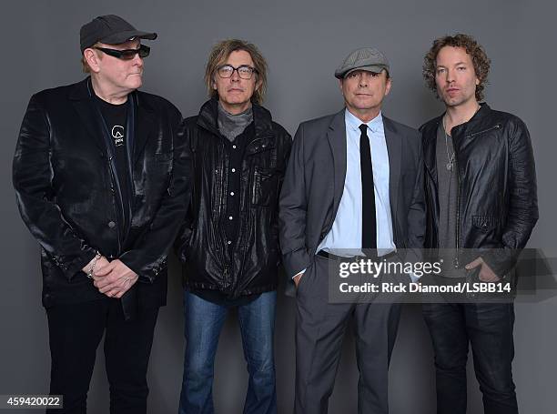 Rick Nielsen, Tom Petersson, Robin Zander, and Daxx Nielsen of Cheap Trick pose backstage at One More For The Fans! - Celebrating the Songs & Music...