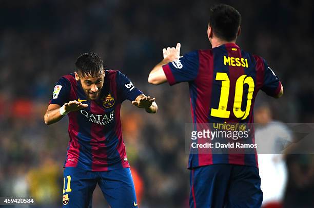 Neymar of FC Barcelona acknowledges to Lionel Messi of FC Barcelona after Messi scored his team's fourth goal during the La Liga match between FC...