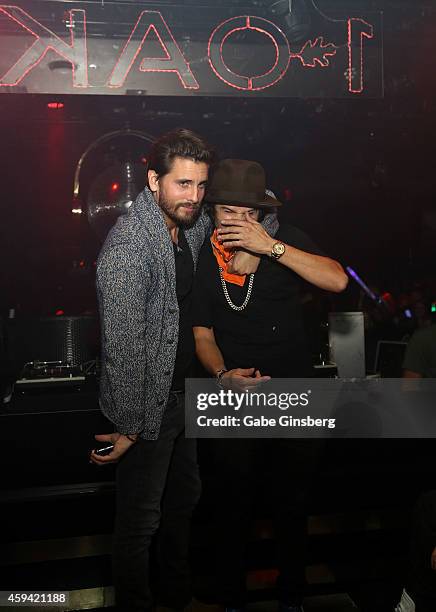 Television personality Scott Disick andÊgraffiti artist Alec Monopoly attend a party at 1 OAK Nightclub at The Mirage Hotel & Casino hosted by Disick...