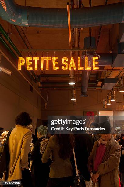 Visitors wait to enter the Dries Van Noten 'Carte Blanche' at the ASVOFF 7 : Day 2 at Beaubourg on November 22, 2014 in Paris, France.