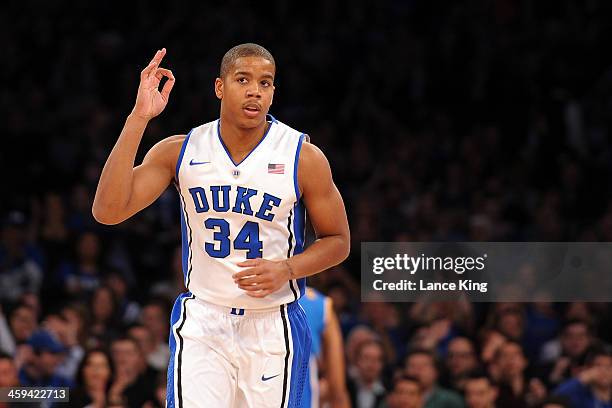 Andre Dawkins of the Duke Blue Devils reacts against the UCLA Bruins during the CARQUEST Auto Parts Classic at Madison Square Garden on December 19,...