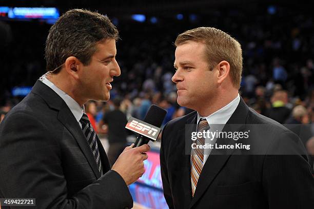 Analyst Andy Katz interviews Associate Head Coach Steve Wojciechowski of the Duke Blue Devils against the UCLA Bruins during the CARQUEST Auto Parts...