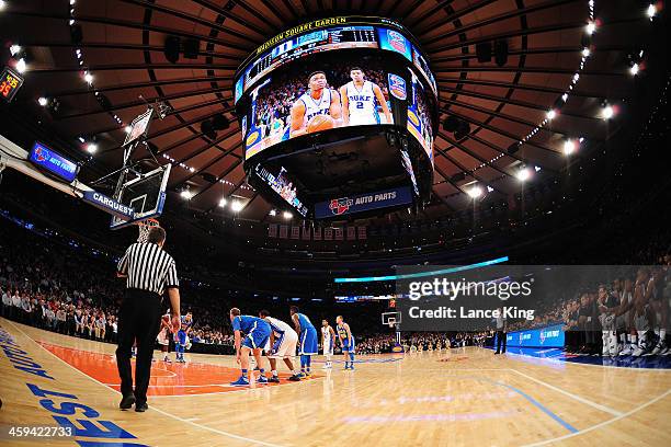 General view as Jabari Parker of the Duke Blue Devils shoots a free throw against the UCLA Bruins during the CARQUEST Auto Parts Classic at Madison...